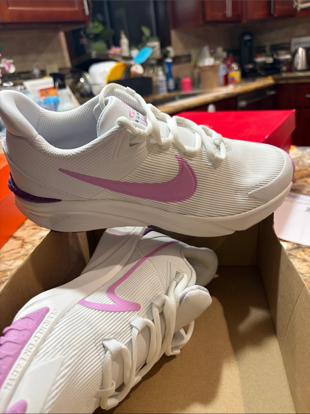Nike Kids White Sneakers with Pink Swoosh